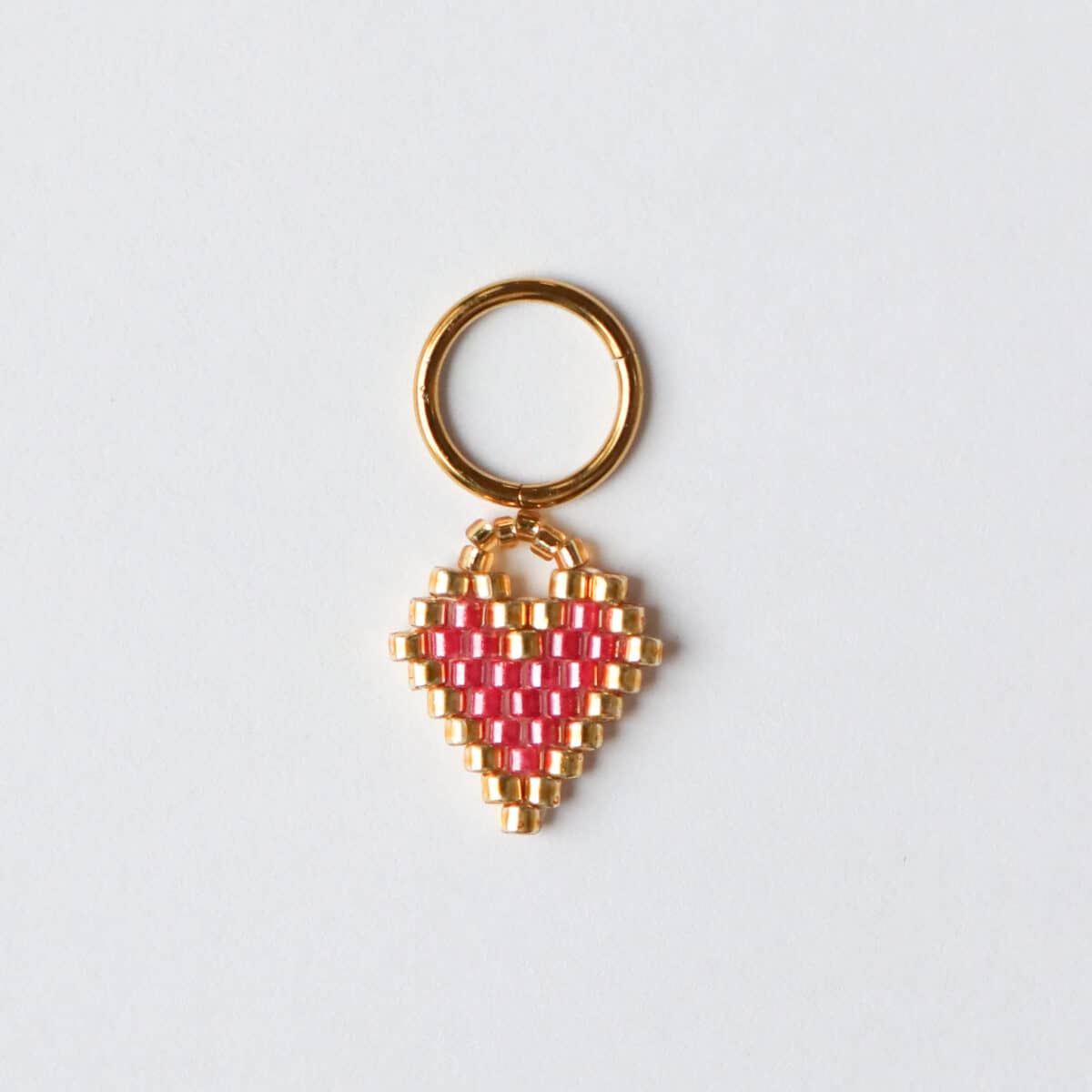 Label Kiki | Dizzy pink heart charm gold