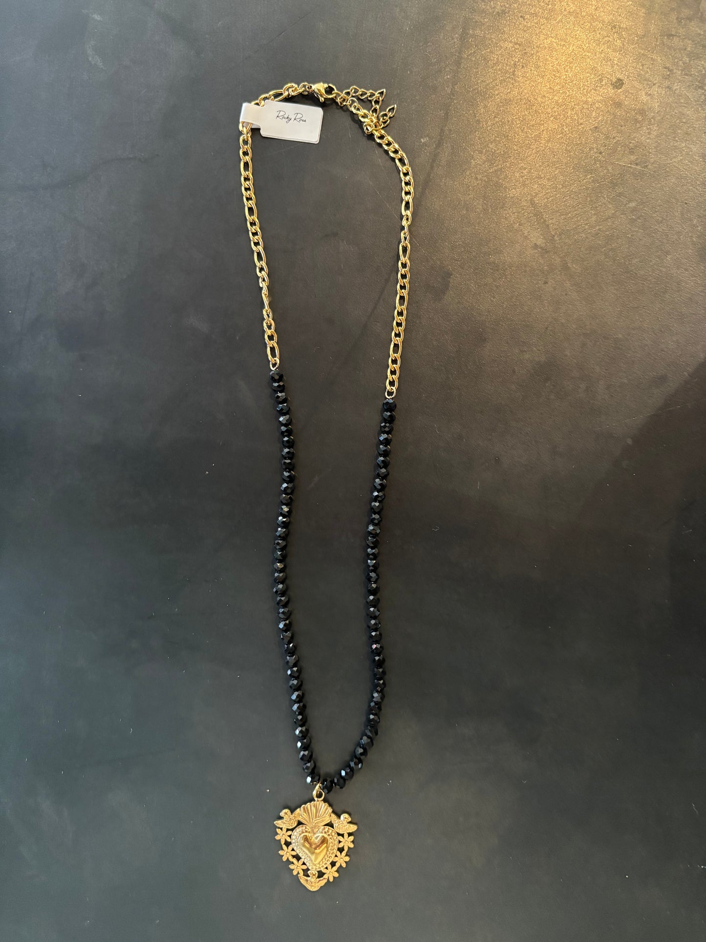Rocky Rosa | Ketting zwart/goud met bedel