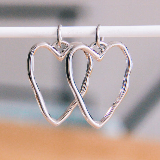 Bazou | RVS oorring met XL open hart – zilver – SO7418